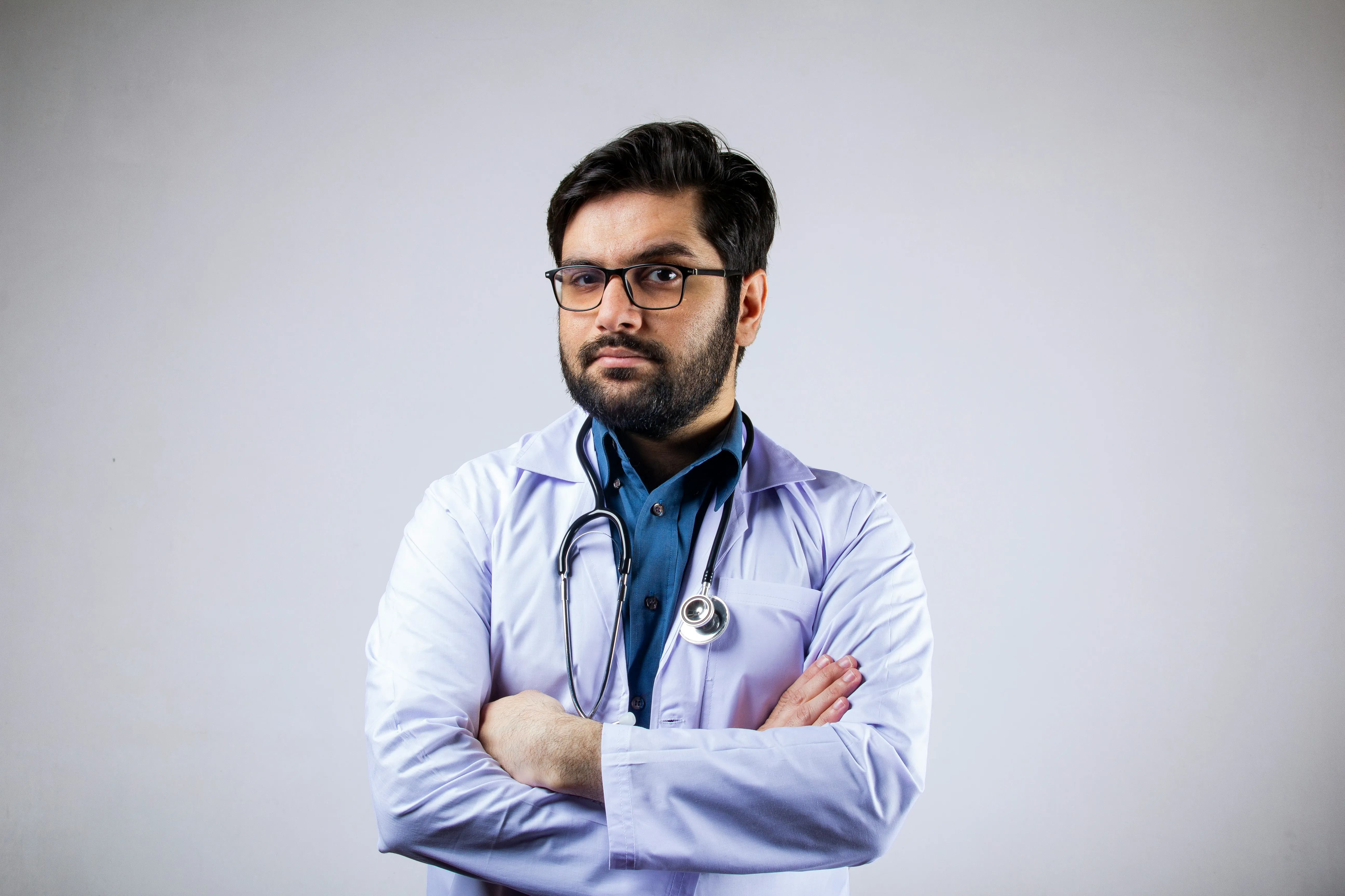 Portrait of Dr. Anshul in a clinical coat
